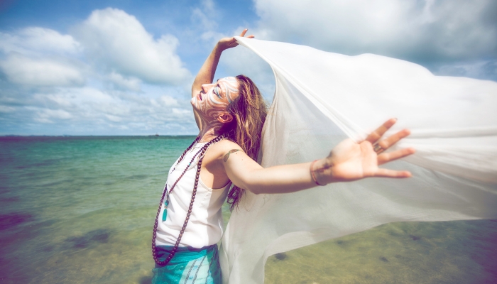 Woman feeling every part of her dream while walking on water