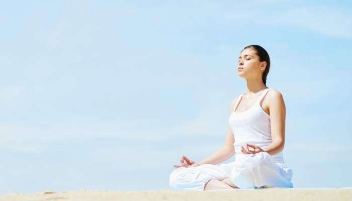 Woman doing meditation of some kind
