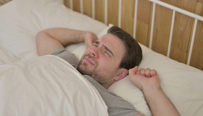 Man waking up from dreamless night