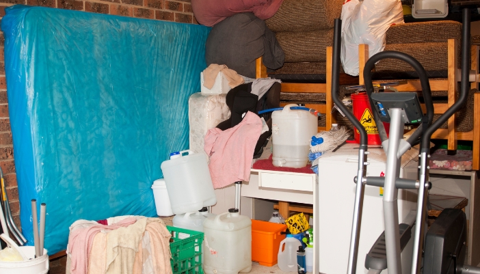 Closeup of a mattress being stored in a garage
