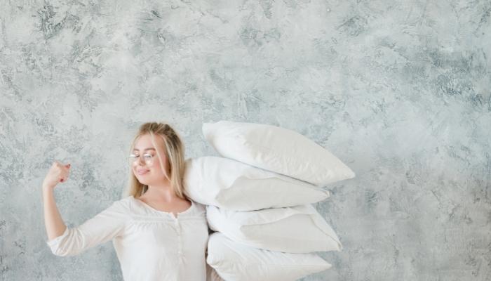 Woman feeling accomplished with cooling pillows