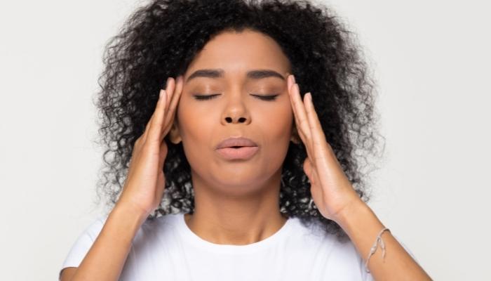 Woman trying to calm down her brain