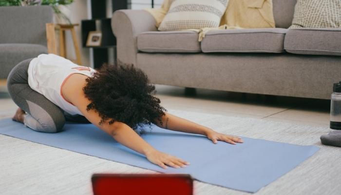 woman in child's pose