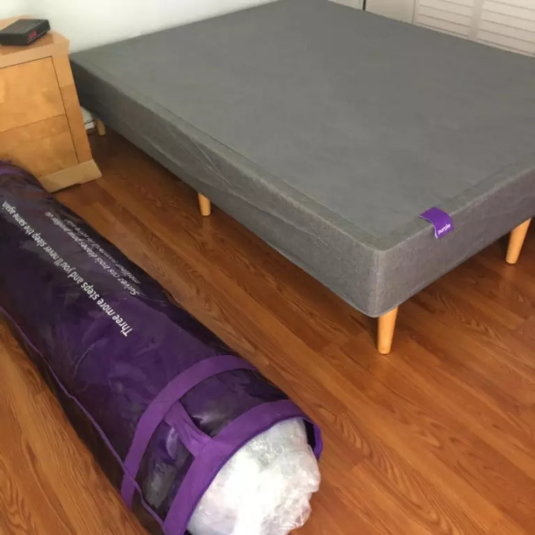 Purple mattress in a box delivery