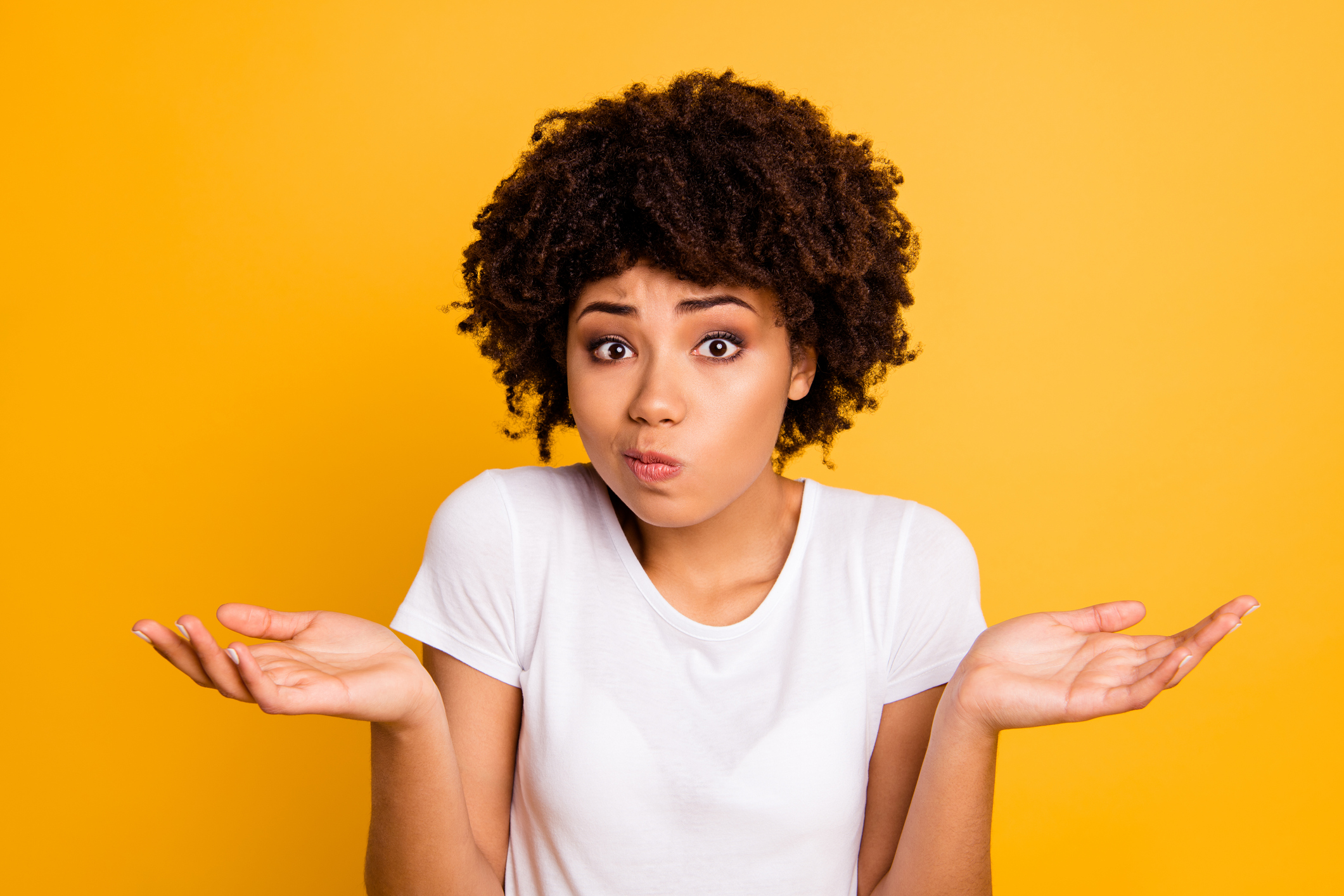 puzzled woman shrugging
