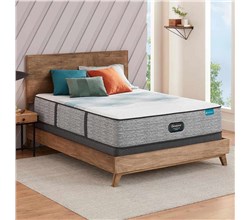 ultra plush mattress on bed frame with throw pillows