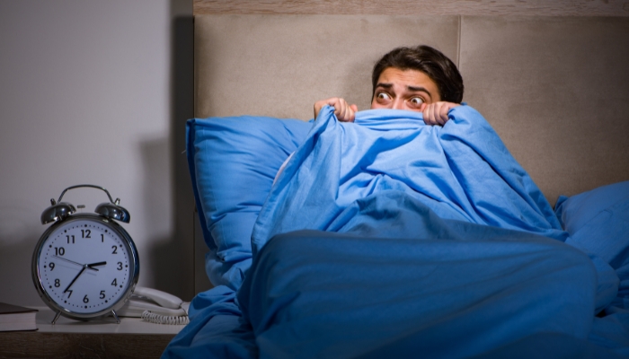 Man awake at 2 AM afraid of something in the corner of the room