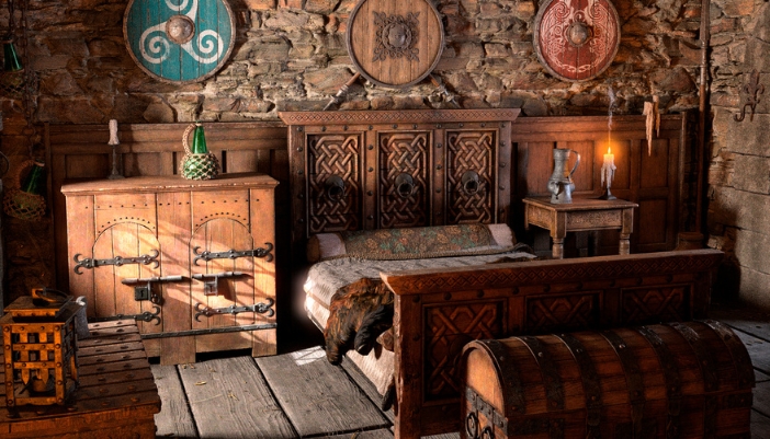 A dimly lit medieval bedroom with wooden furniture and a brick wall.