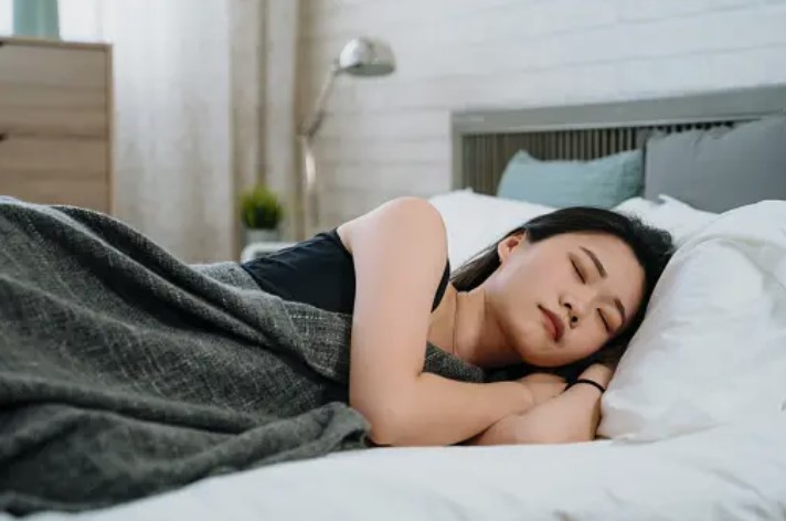 woman sleeping on her side