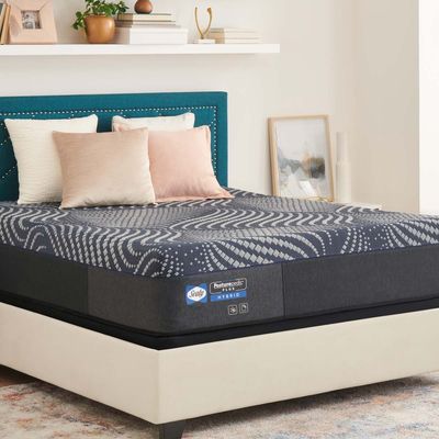 The Sealy Posturepedic Plus Brenham mattress in a bedroom 