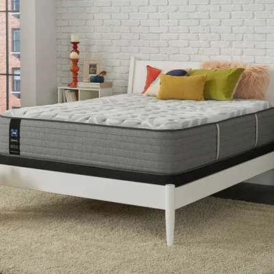 The Sealy Posturepedic Sliver Pine mattress in a bedroom 