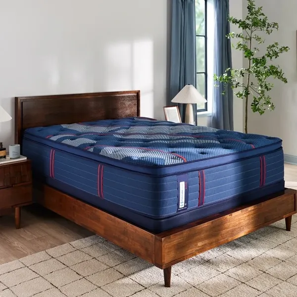 Credit: Sealy The Sealy Posturpedic Elite Brenham II mattress in a bedroom