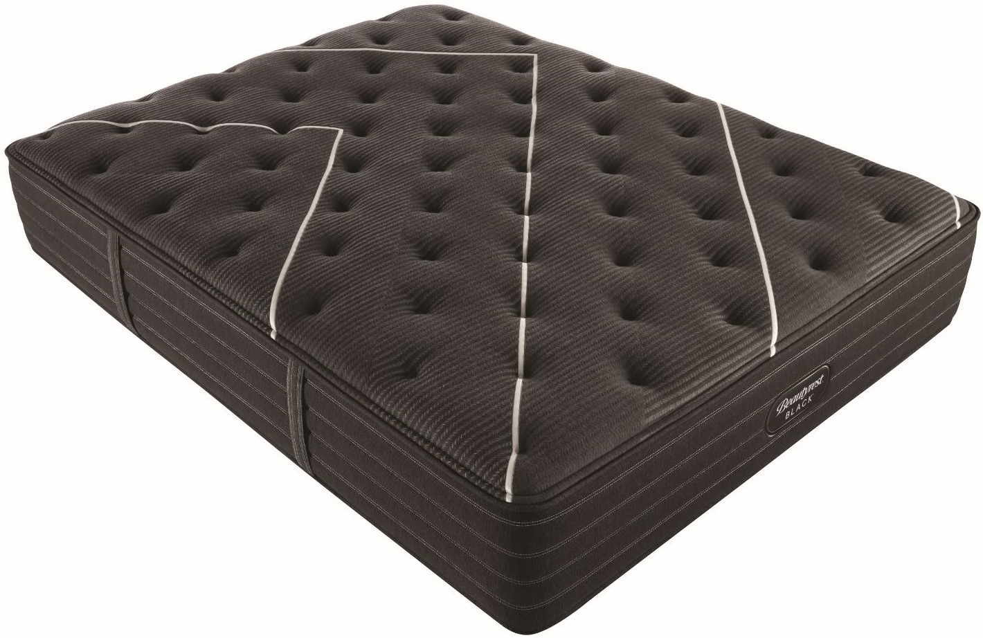 relaxed couple lounges on Beautyrest Black mattress in bedroom