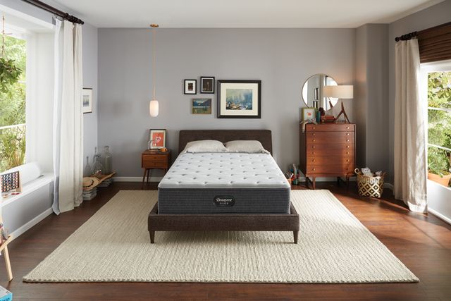 mattress on a foundation in a modern bedroom