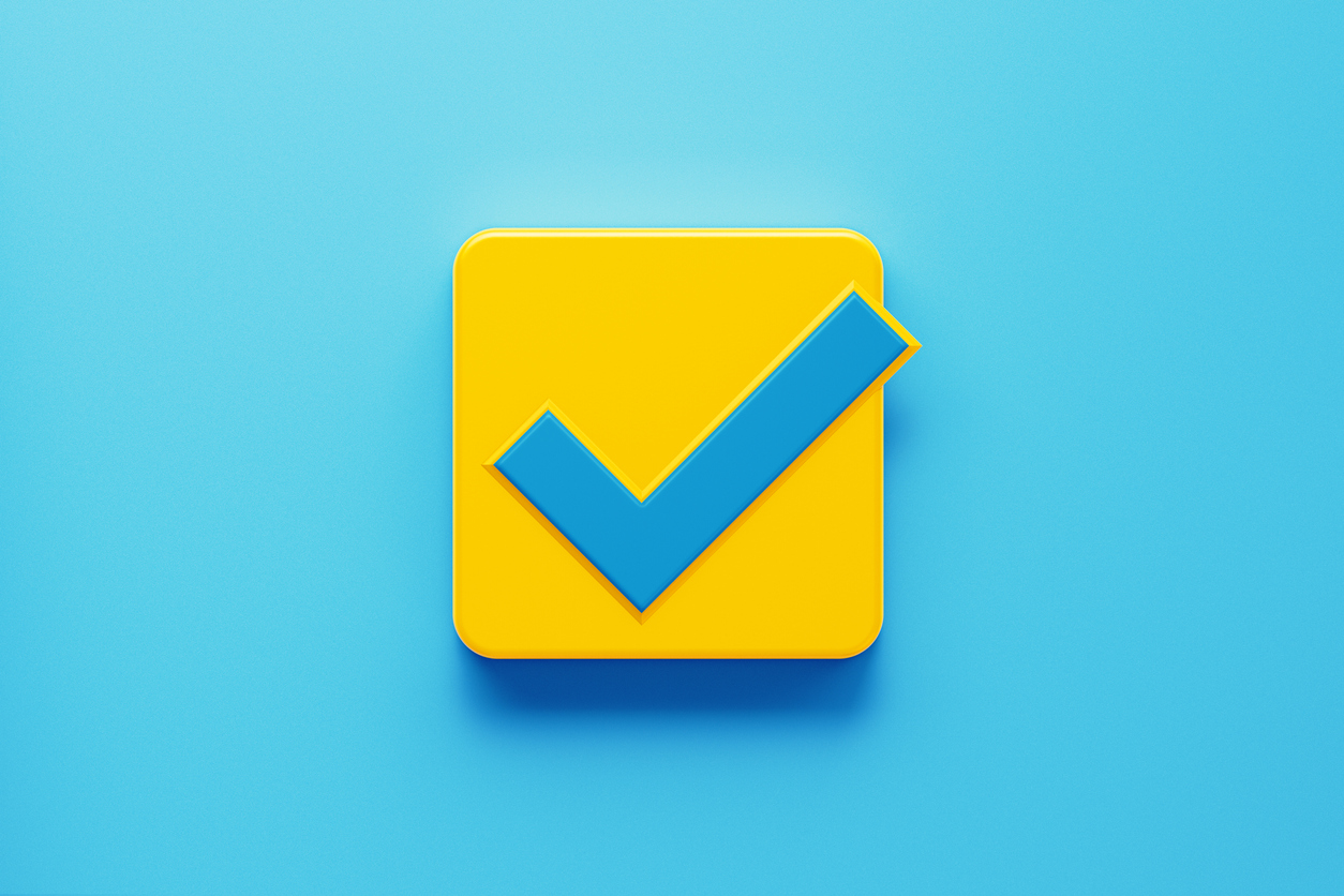 Graphic of a blue check mark against a yellow box on a sky-blue background 