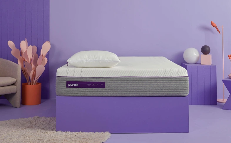 Purple mattress in a purple room