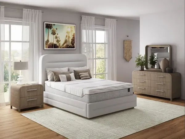 The Scott Living by Restonic hybrid mattress with bedroom furniture and décor 
