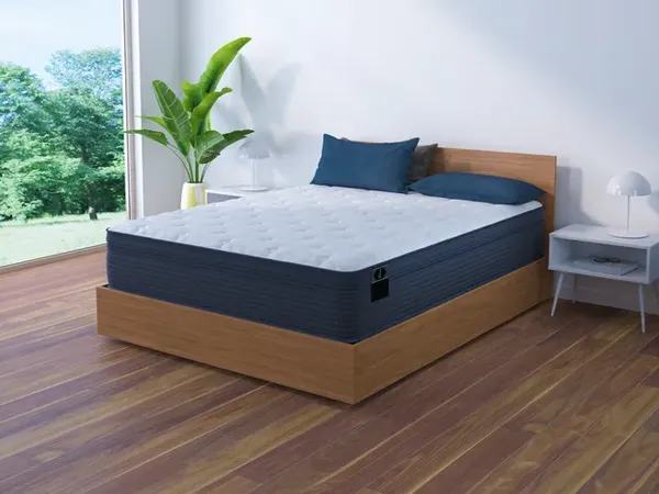 front view of a queen size mattress in a modern bedroom