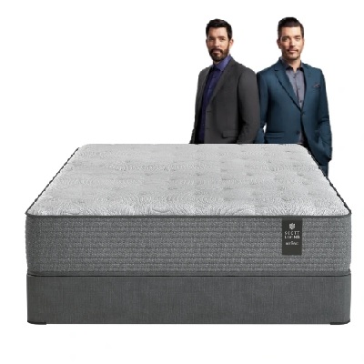 Front view of the Scott Living Ferndale collection wrapped coil mattress next to the property brothers 