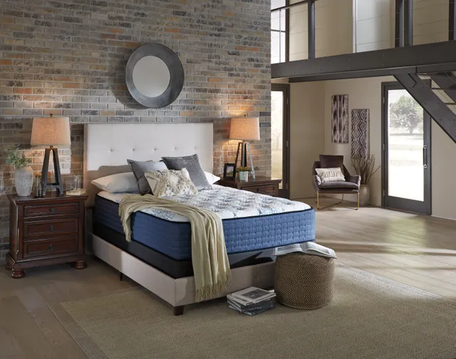 The Sierra Sleep by Ashley M622 Mt. Dana collection hybrid mattress with bedding and décor 