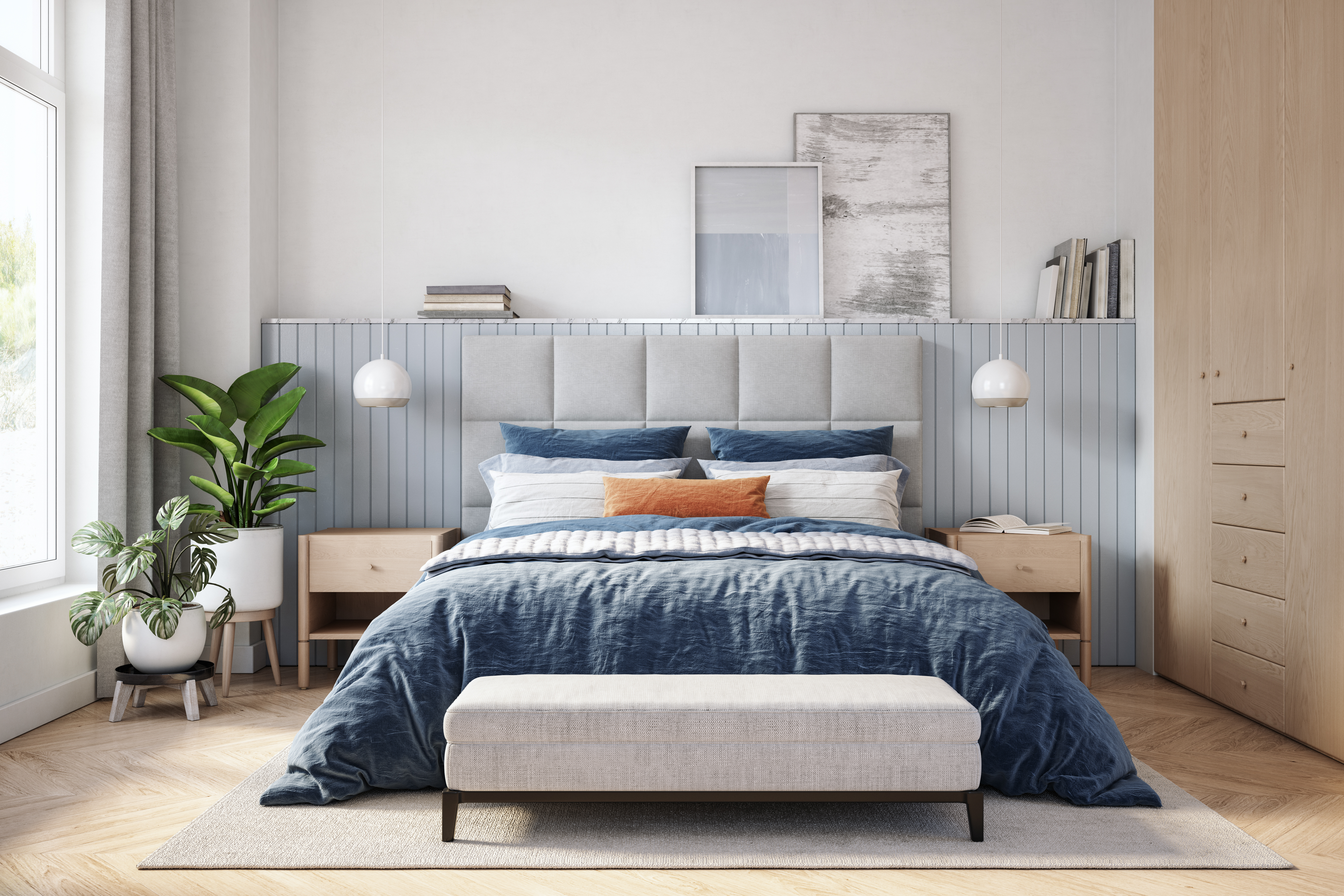 A bed with a grey headboard atop a low profile box spring 