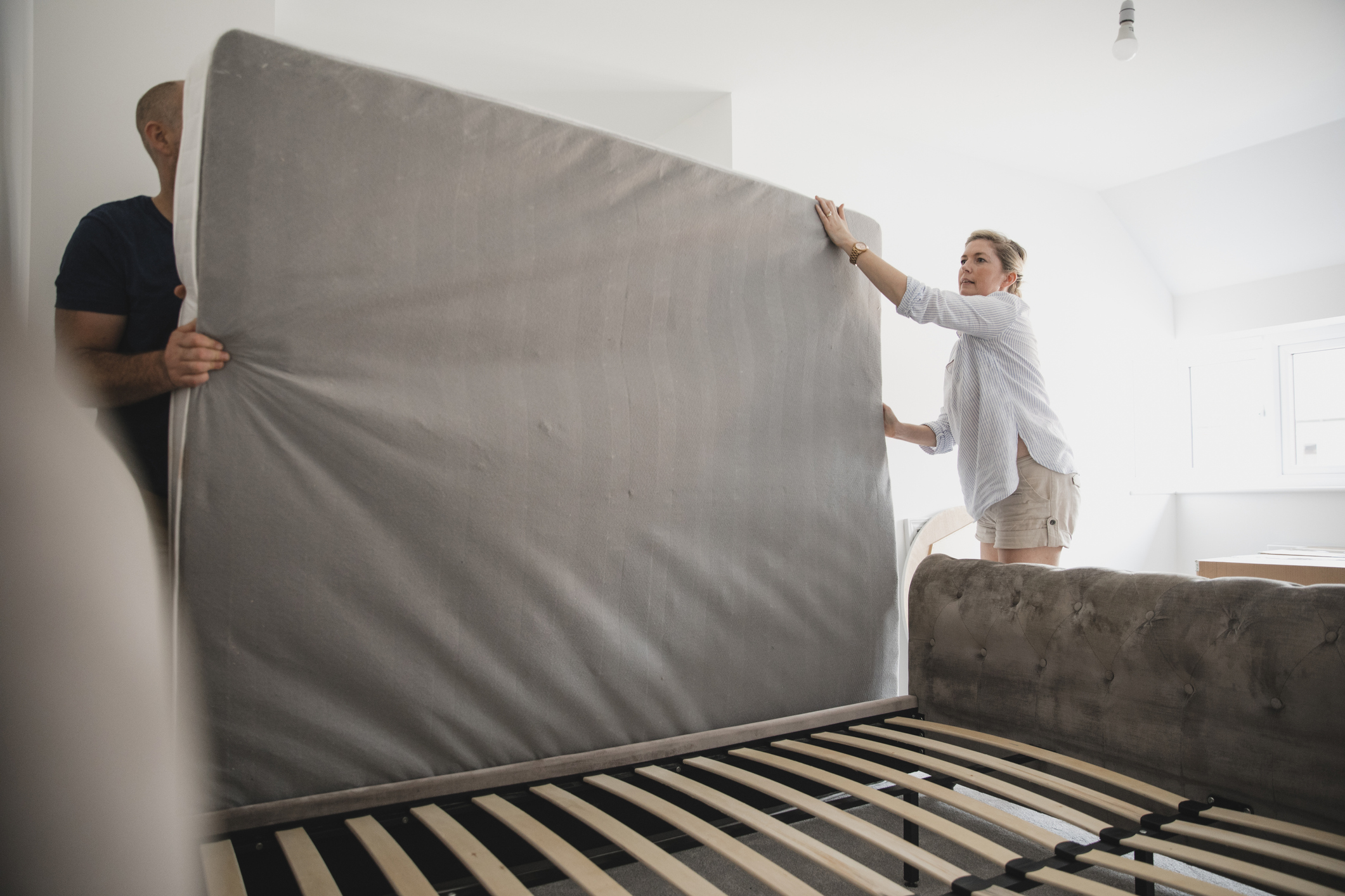 Couple flipping box spring mattress base