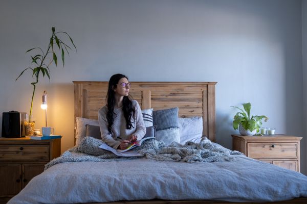 Woman Sitting on Studying