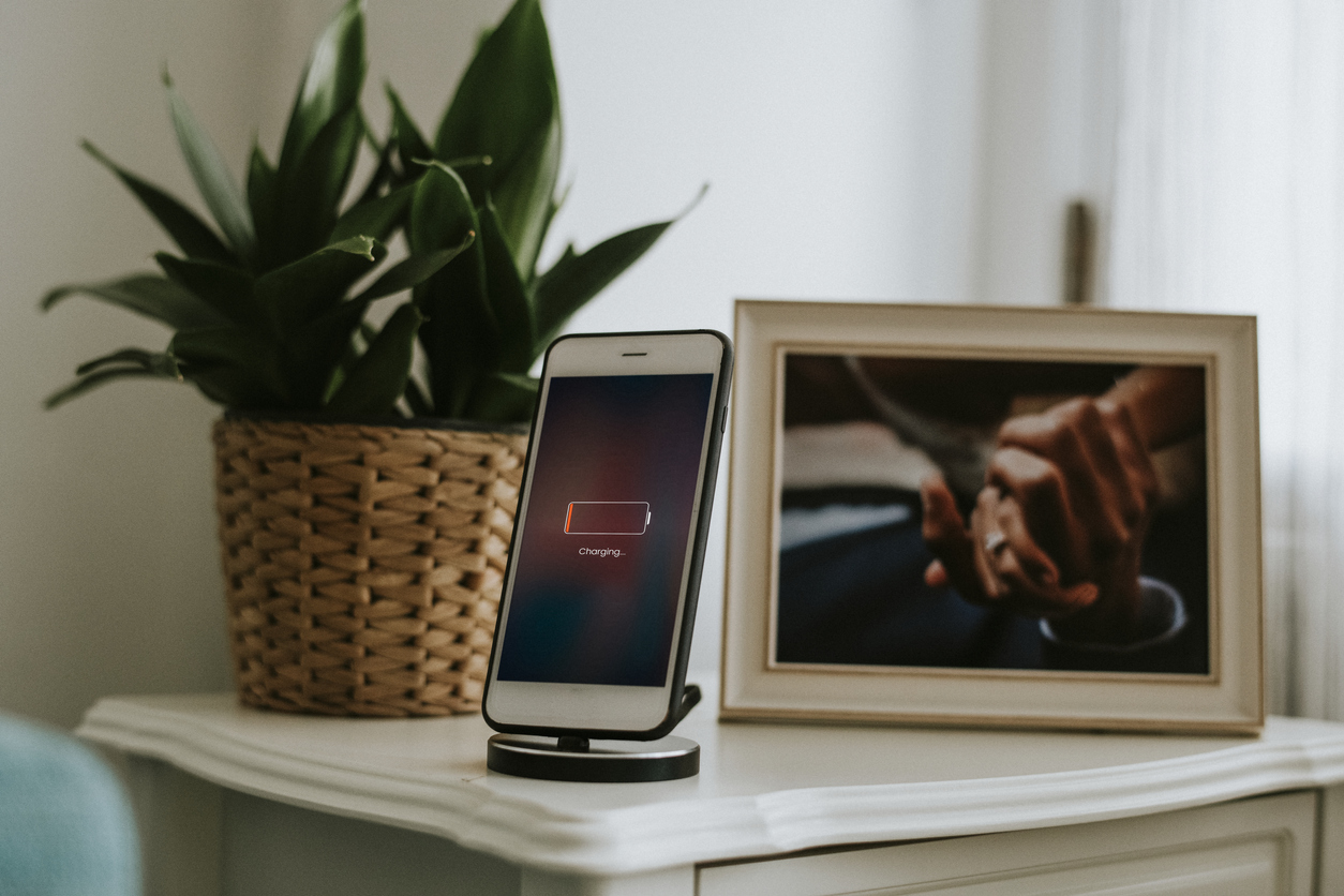 smartphone with low power battery on nightstand