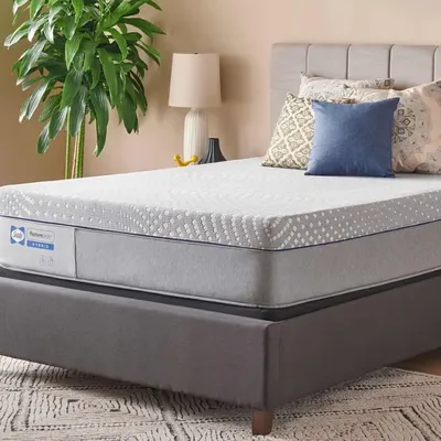 The Sealy Posturepedic Lacey collection mattress with bedding and décor 