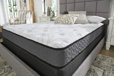 The Sierra Sleep by Ashley Bonnell hybrid mattress with décor 