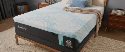 The Tempur-Pedic TEMPU-ProBreeze hybric mattress with bedding 