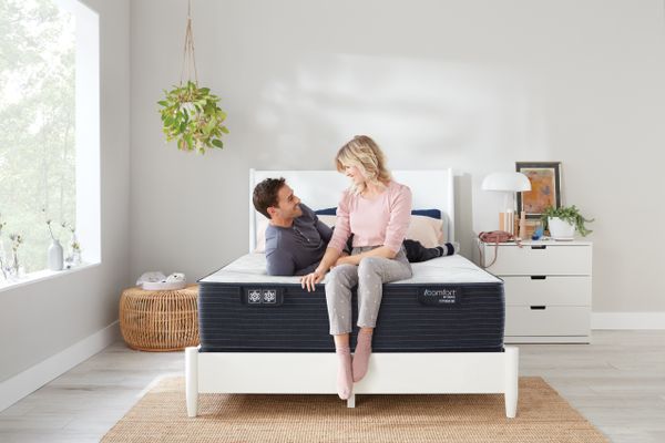 Credit: Serta A couple on a Serta mattress