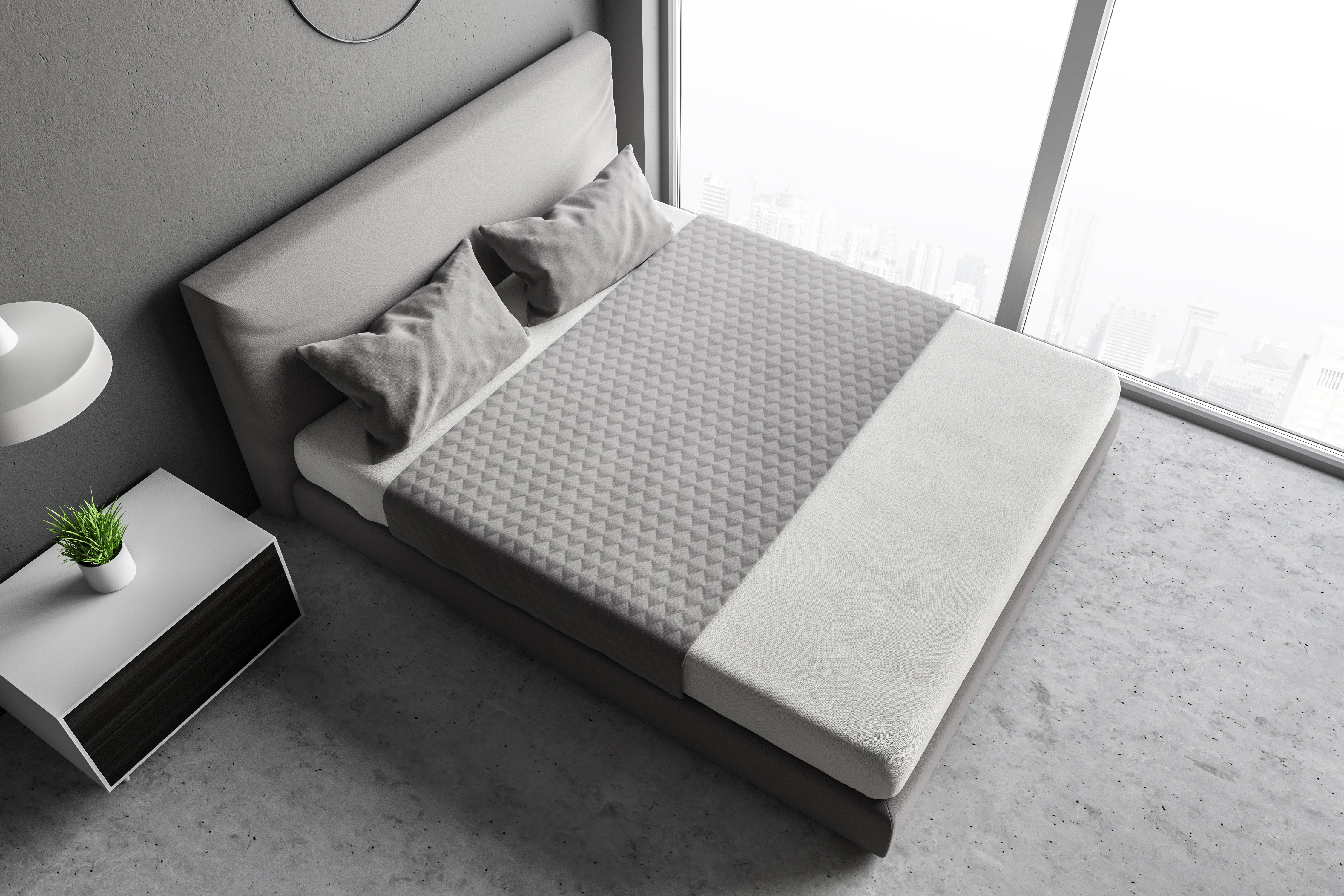 Overhead look at a modern-style low-profile gray mattress foundation 