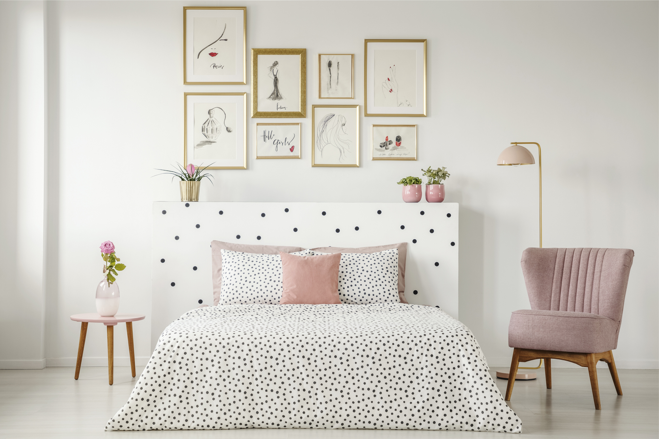 clean bedroom with pink accents