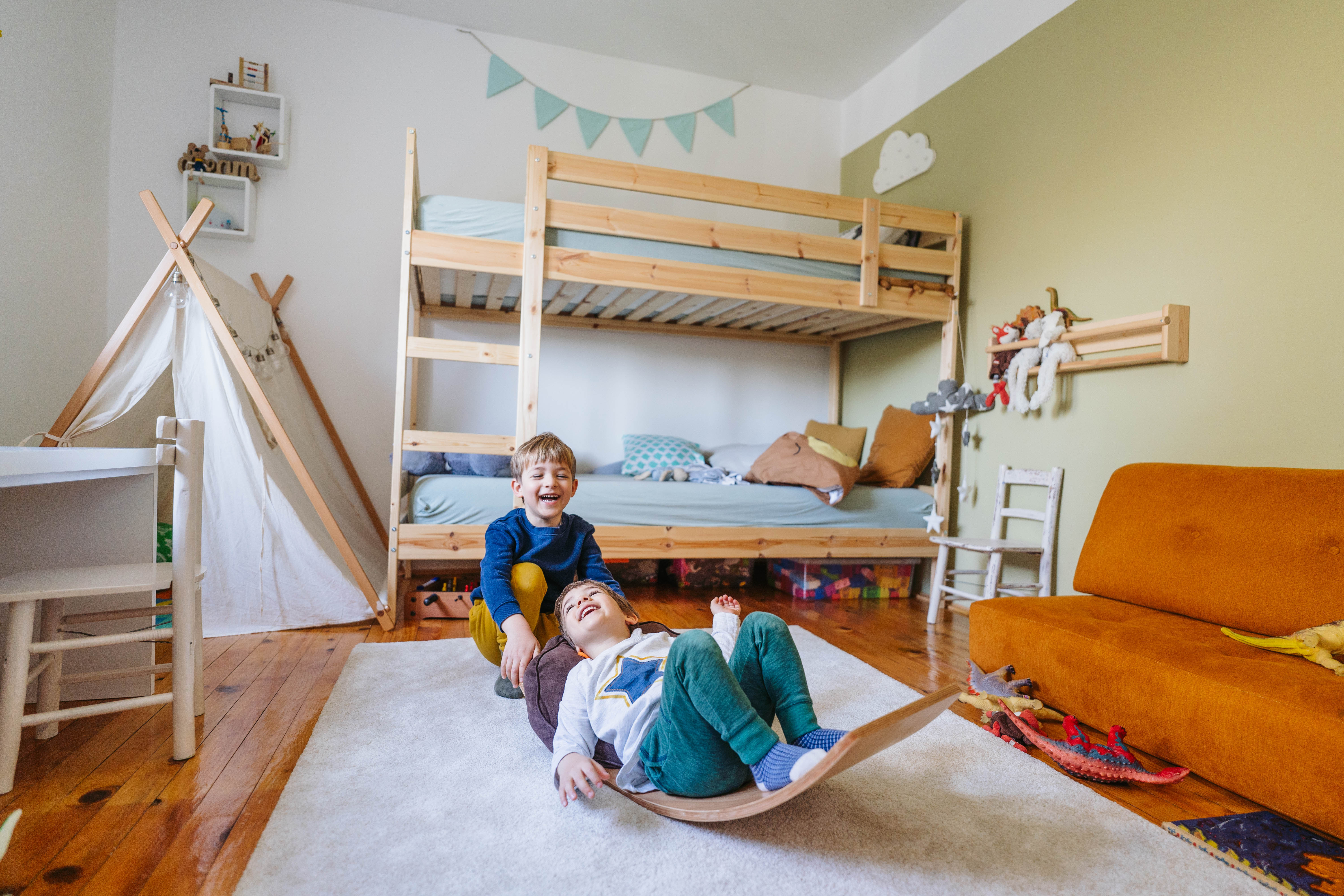 Children playing on bunk beds