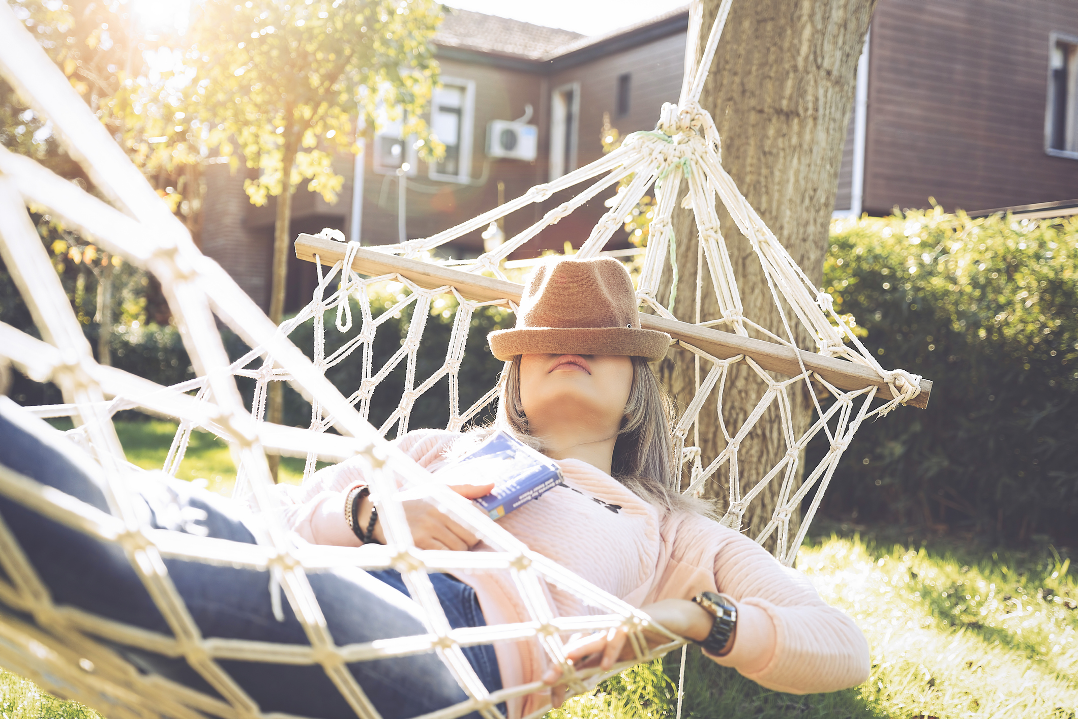 Woman taking a nap in a hammock