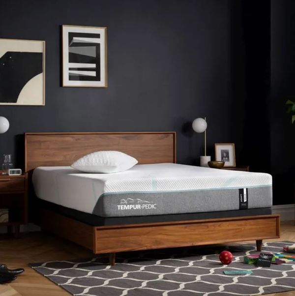 A Tempur-Pedic Adapt mattress in a bedroom