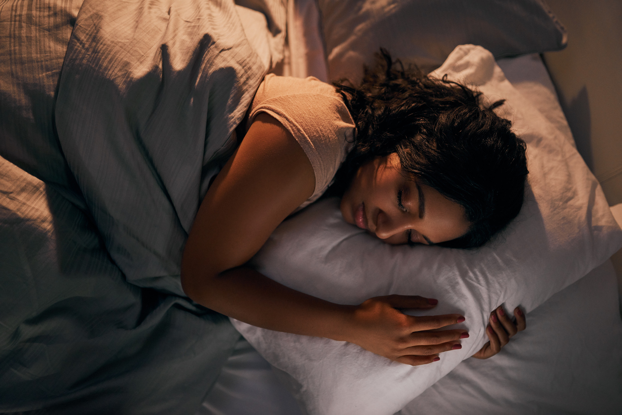 woman sleeping on side