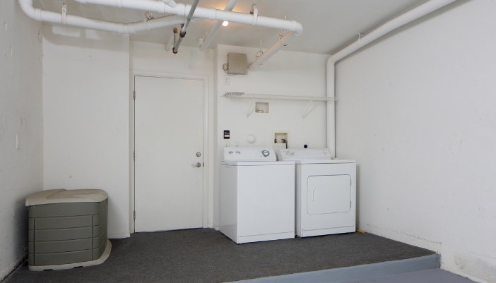 Closeup of laundry appliances in a garage