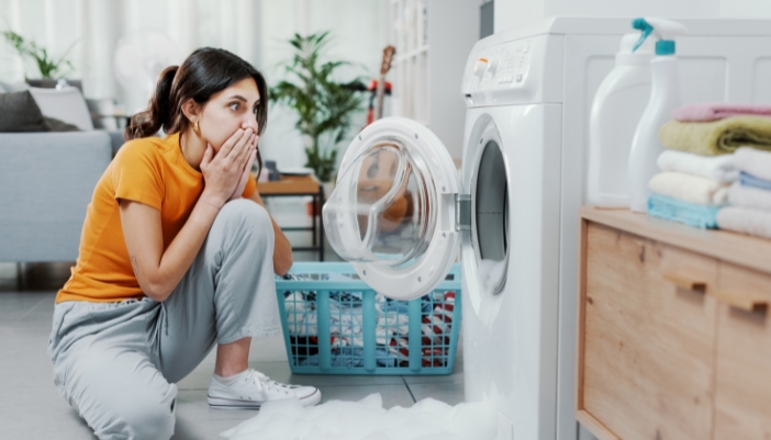 Serv_Urgent-Appliance-First-Aid_2.jpg Woman horrified that her washer is leaking bubbles