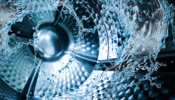 A concept image of a washer running a cleaning load