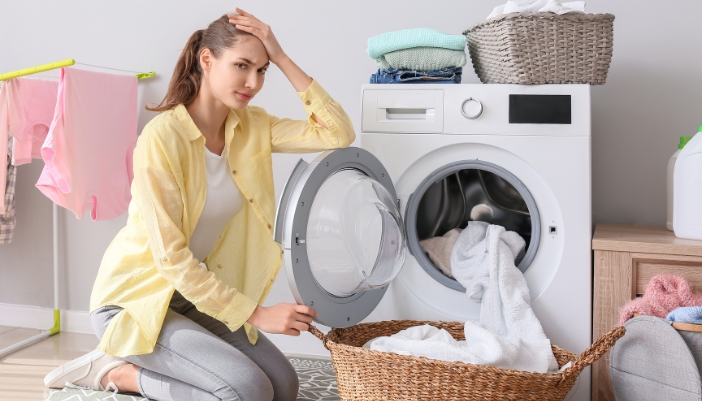 Woman frustrated with her damp clothes