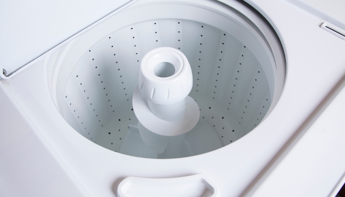 Closeup view of top-load washer with agitator