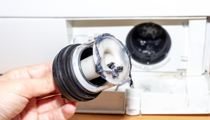 Closeup of a grody drain pump filter