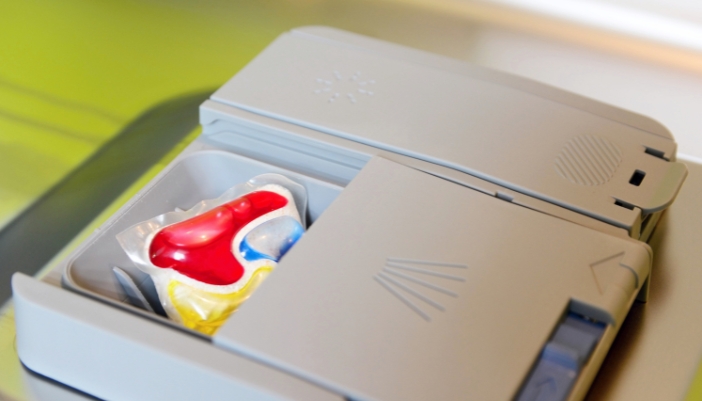 Closeup of a detergent packet in a dishwasher