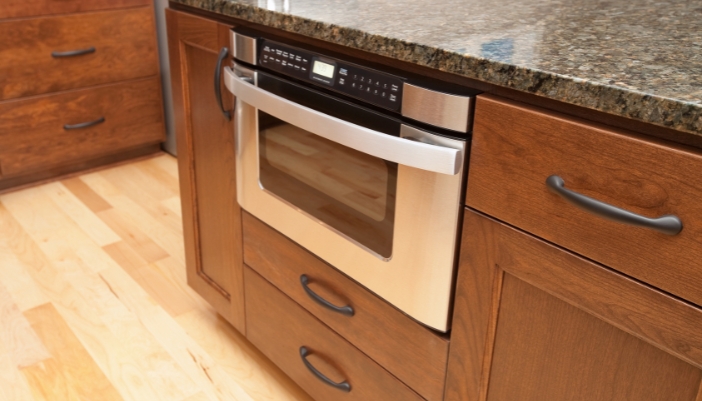 Side angle view of a microwave drawer