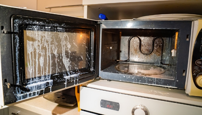 Closeup of a burnt-out microwave