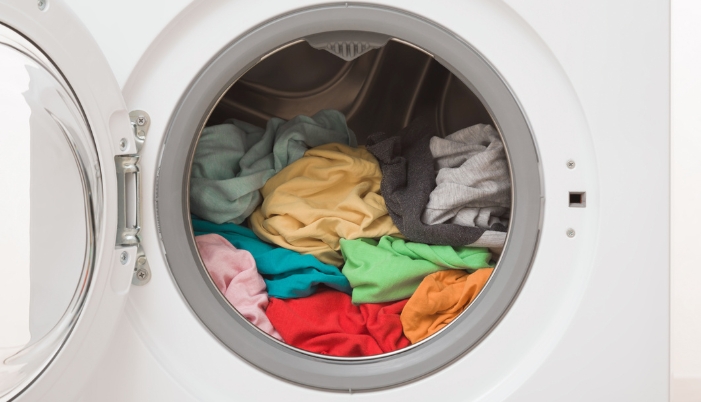 A properly loaded washer that is only ¾ full