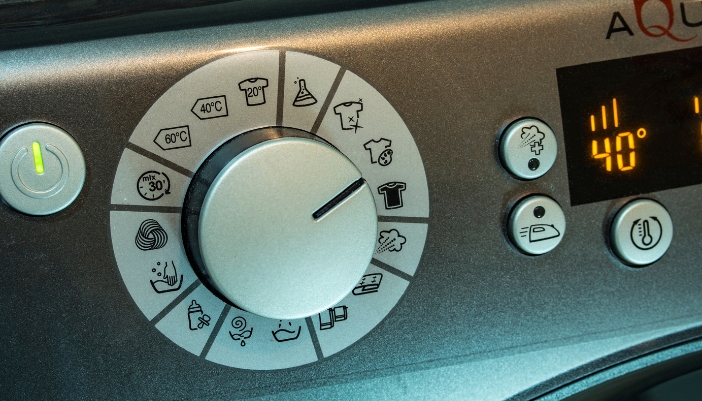 Serv_Washing-Machine-Control-Panel-Issues_4.jpg Closeup of a control panel showing the temperature of a cycle