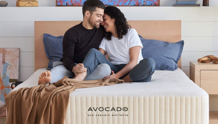 couple sitting on mattress